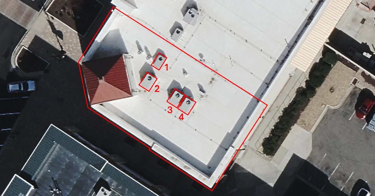 Aerial view of the rooftop with the tenant premises outlined and RTU-1 through RTU-4 annotated